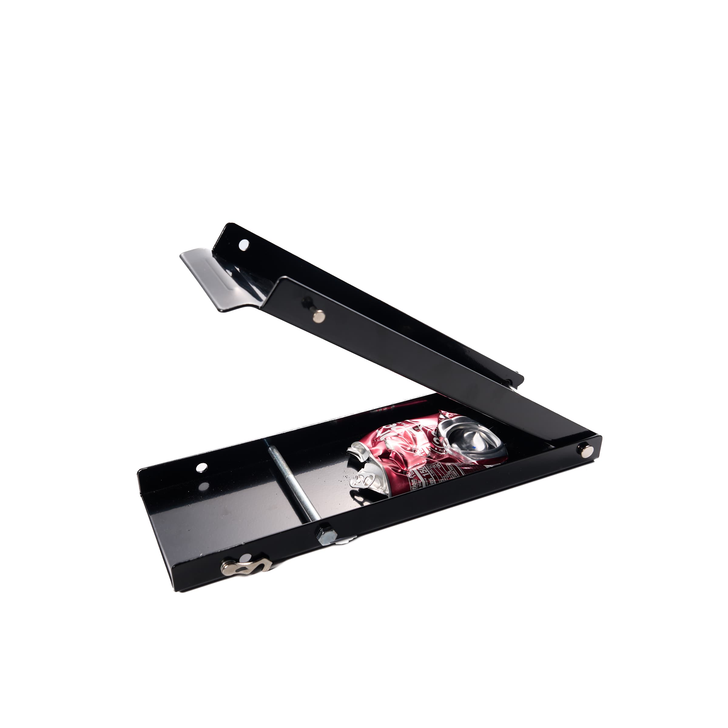 Black metal can crusher shown open with a flattened red aluminum soda can inside.